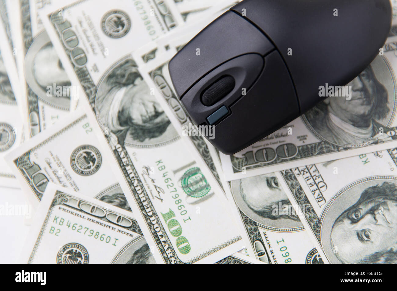 close up of computer mouse and usa dollar money Stock Photo