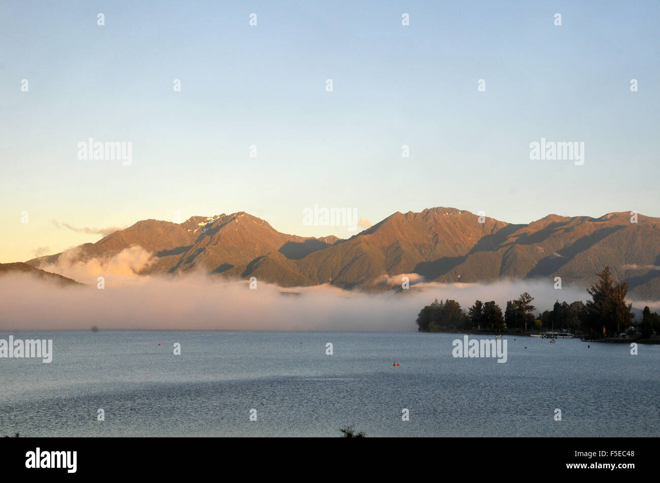 Lake Te Anau at dawn, Te Anau, South Island, New Zealand Stock Photo