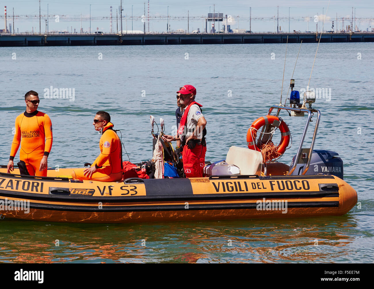 Divers from the Vigili Del Fuoco Italy's agency for fire and rescue service on an inflatable boat Venice Veneto Italy Europe Stock Photo
