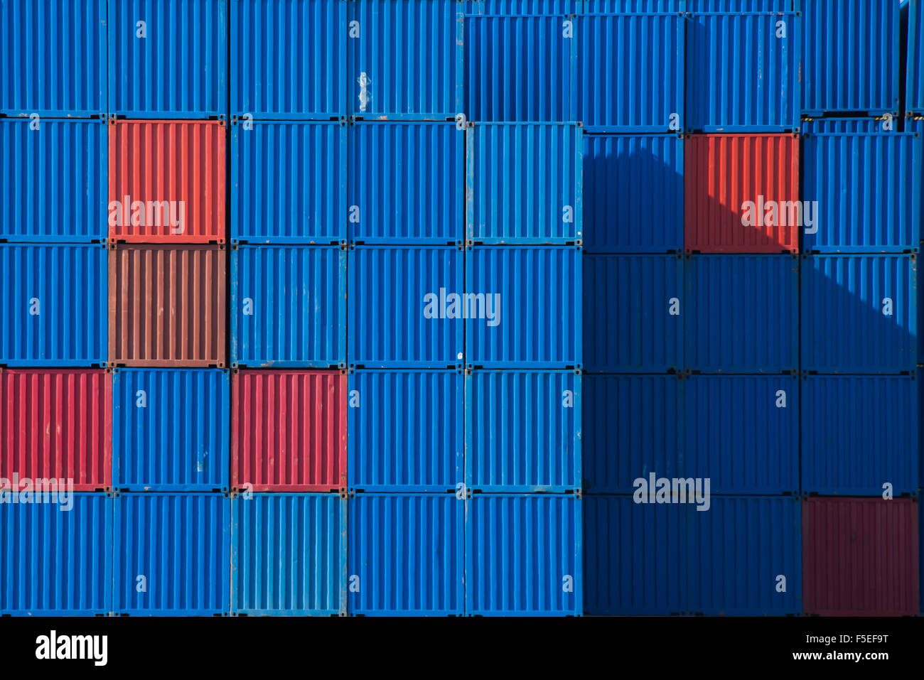 Stacks of shipping containers in a row Stock Photo
