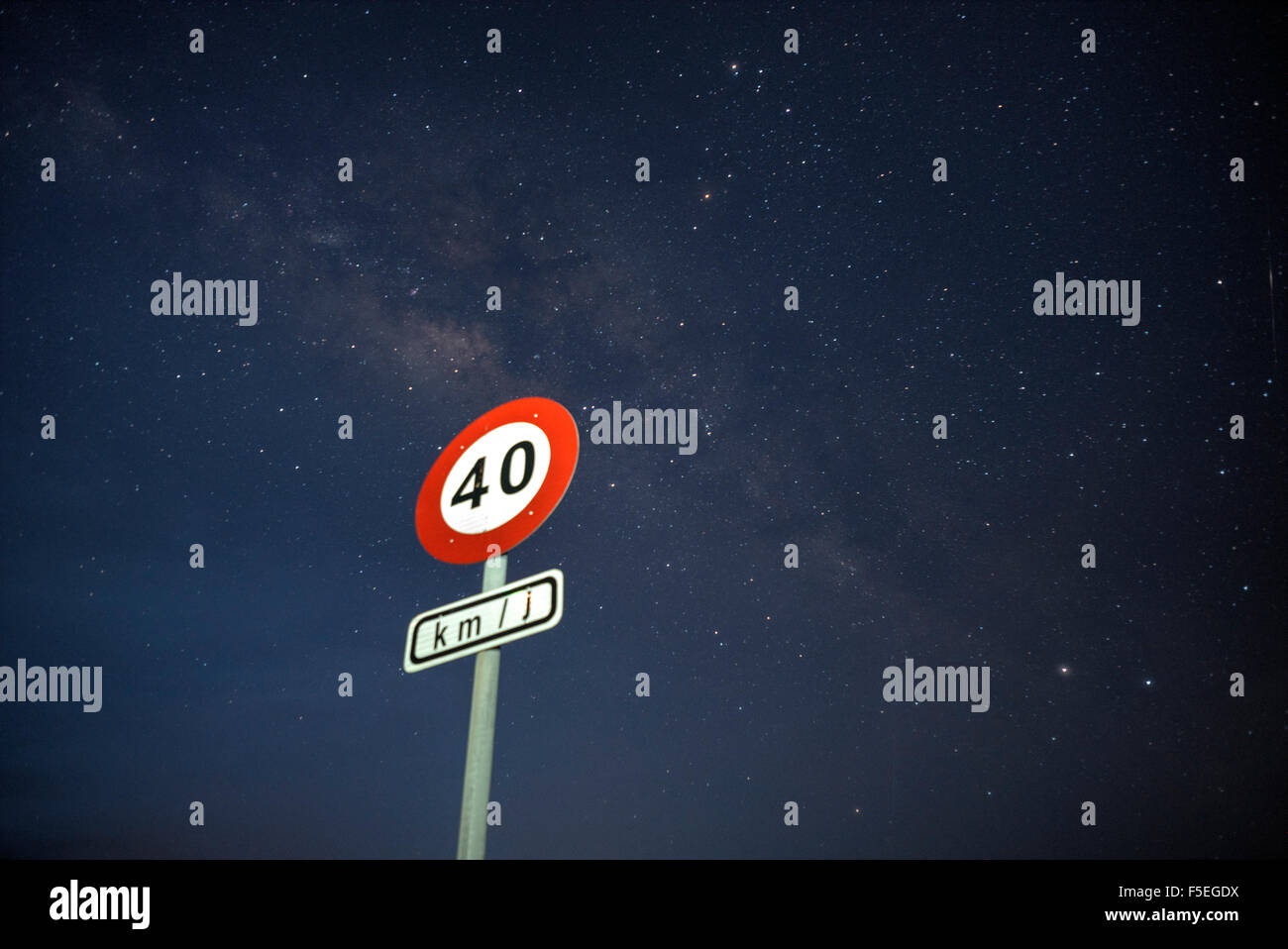 Speed limit road sign at night, Borneo, Malaysia Stock Photo
