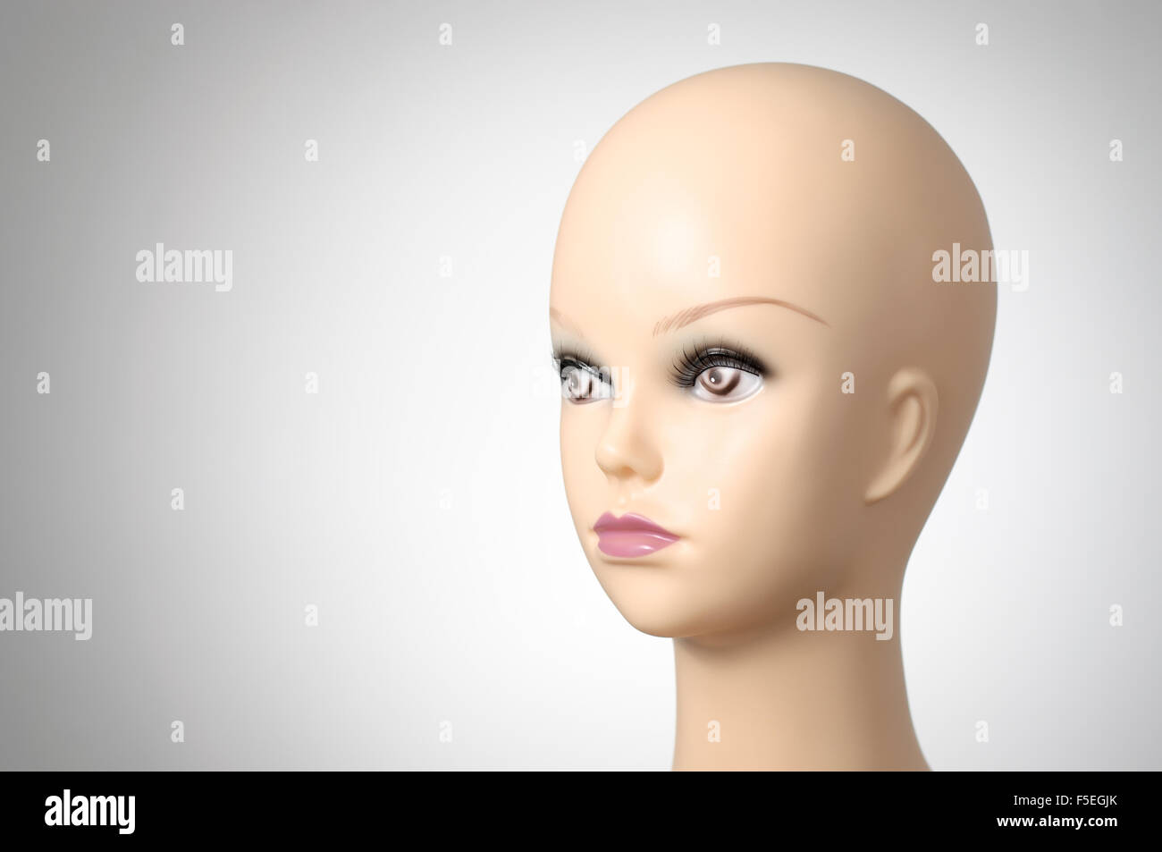 Mannequin head on grey background with copyspace Stock Photo Alamy