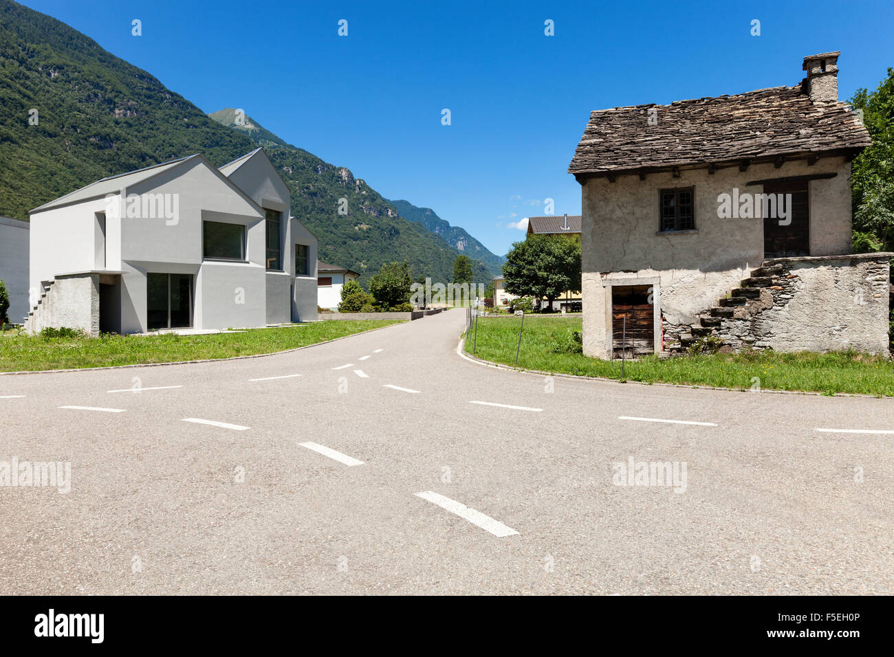 Modern and old house in exterior. Front of crossing Stock Photo