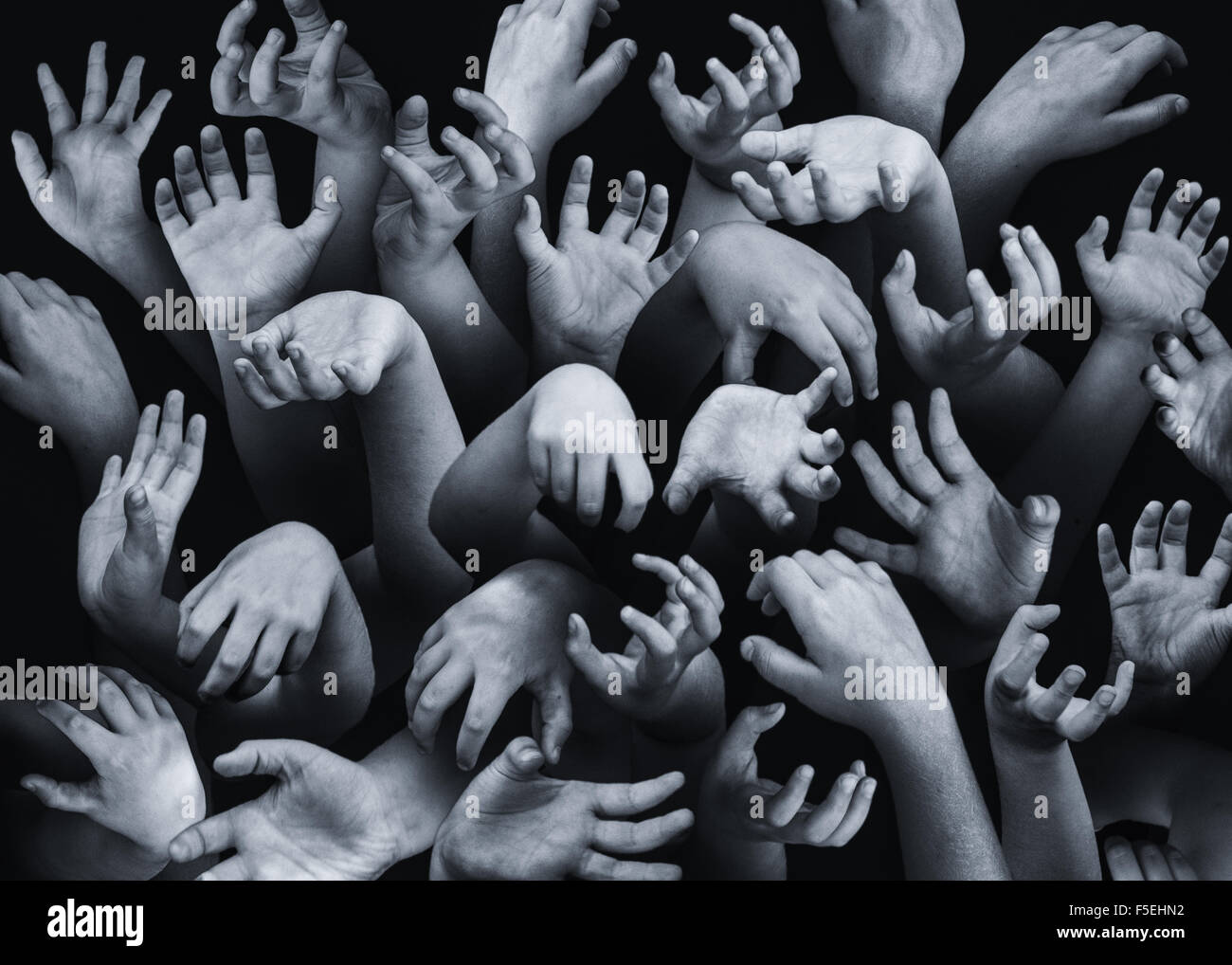 Close-up of hands reaching out Stock Photo