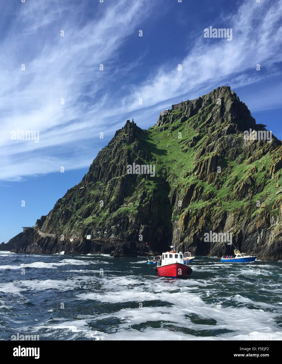 Fishing boats in the Atlantic near Skellig Michael Island, Ireland Stock Photo