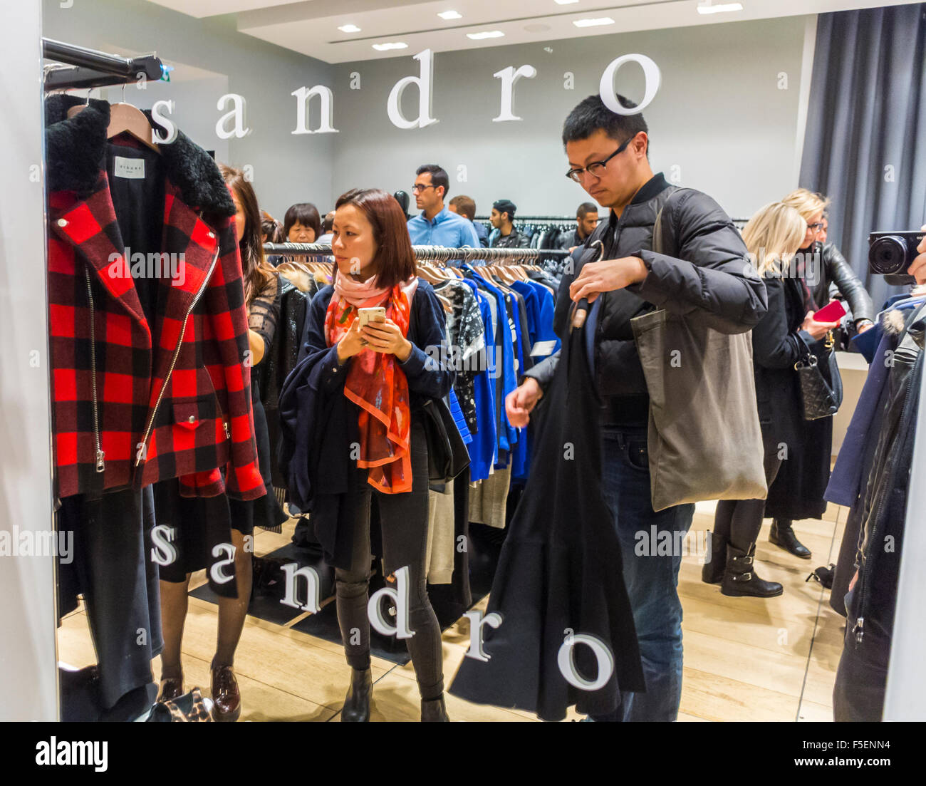 Sandro clothing boutiques men women front logo labels wardrobe retailer ...