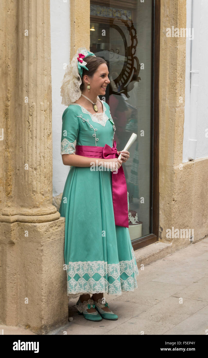 Woman in traditional Andalucian dress in Ronda, Spain Stock Photo
