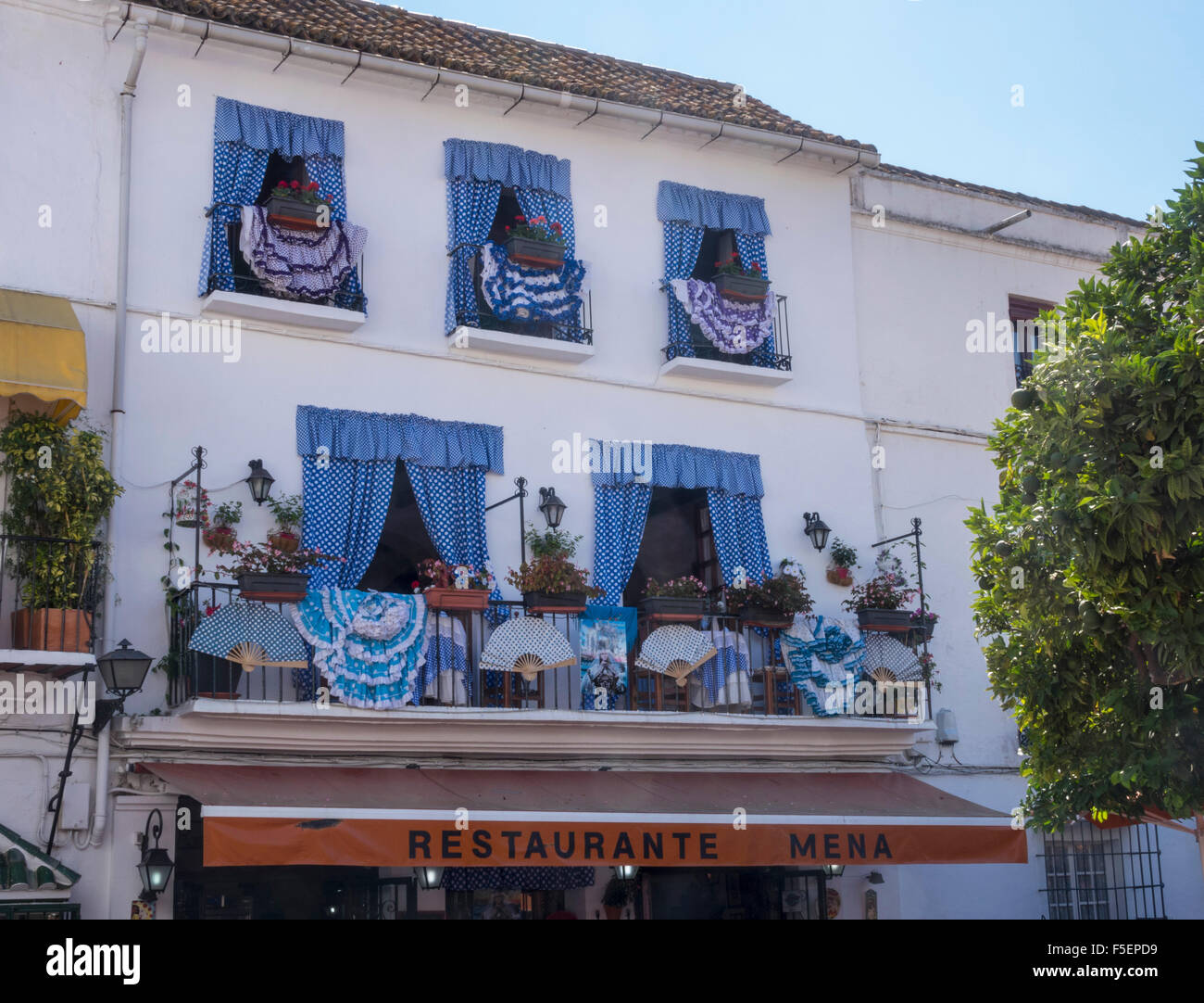 Decorated windows of a restaurant in Plaza de los Naranjos in Marbella, Andalucia, Spain Stock Photo