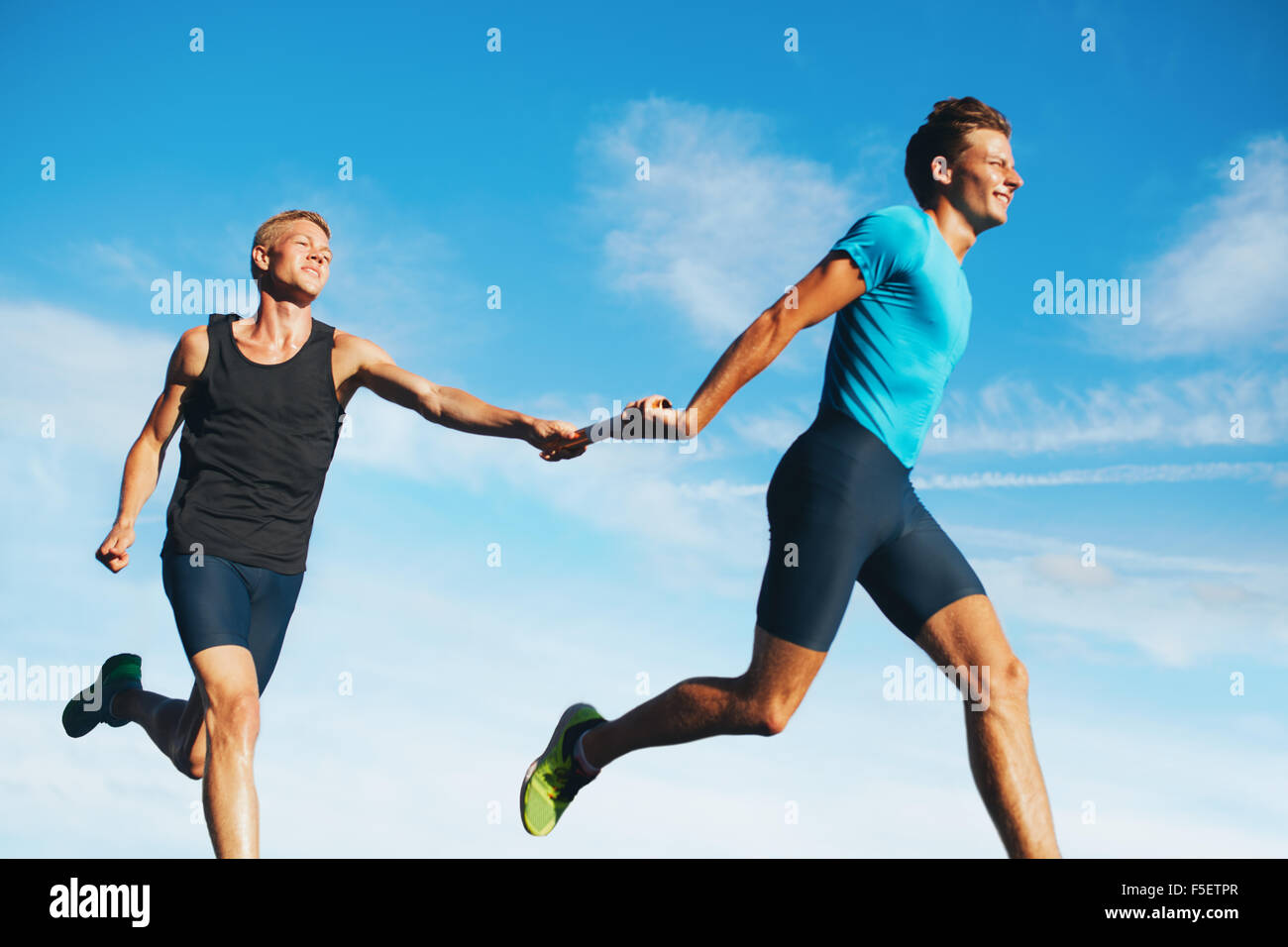 Relay baton passing men hires stock photography and images Alamy
