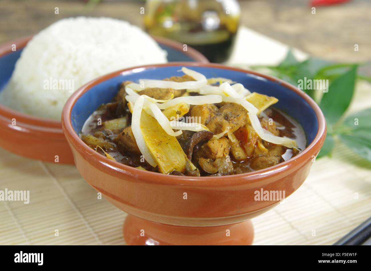 rice and souce on mat background Stock Photo