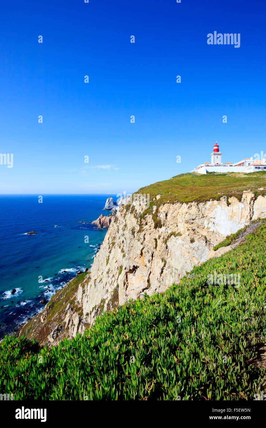 Cabo de Roca, Portugal is the westernmost extent of continental europe. The lighthouse overlooking Atlantic Ocean. Stock Photo