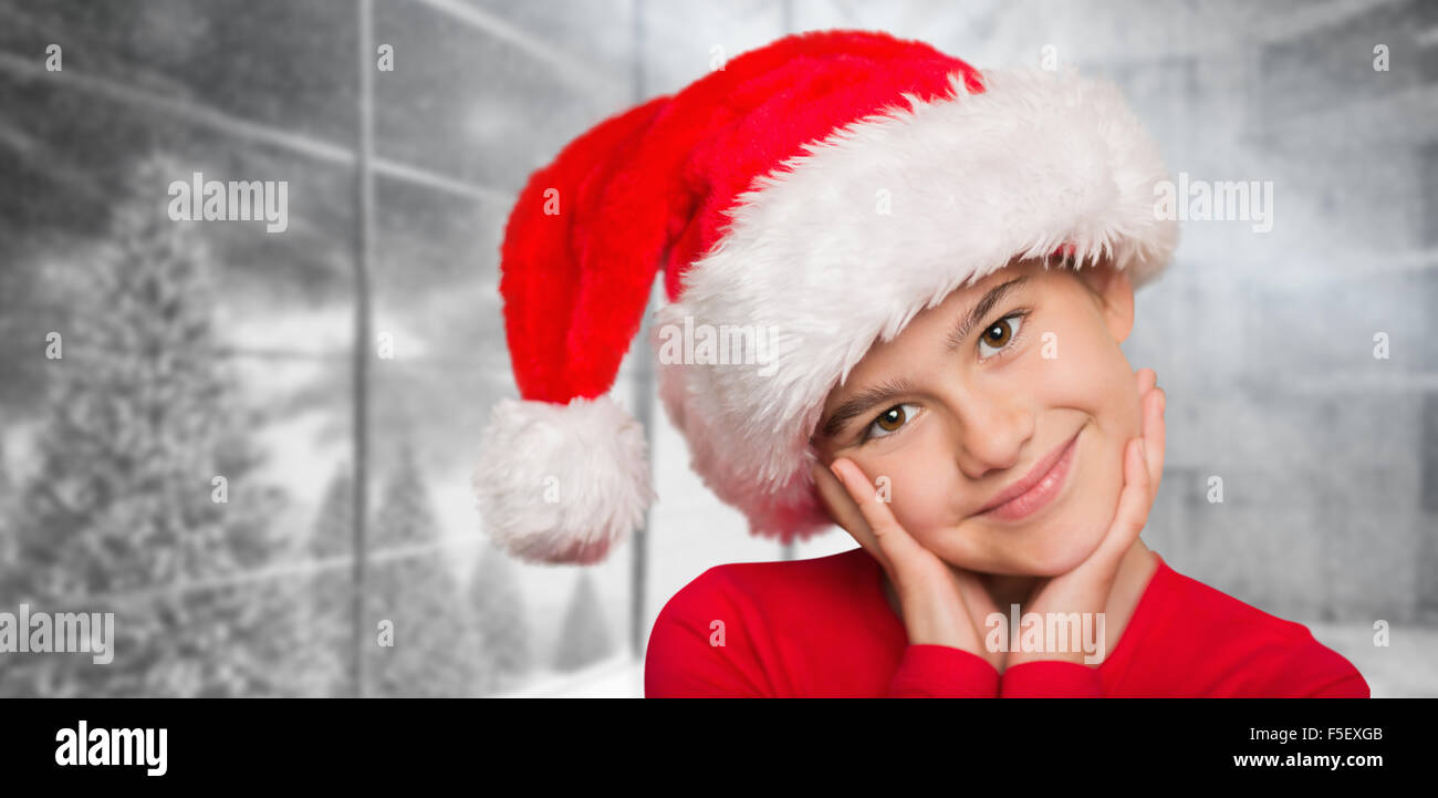 Composite image of festive little girl smiling at camera Stock Photo ...