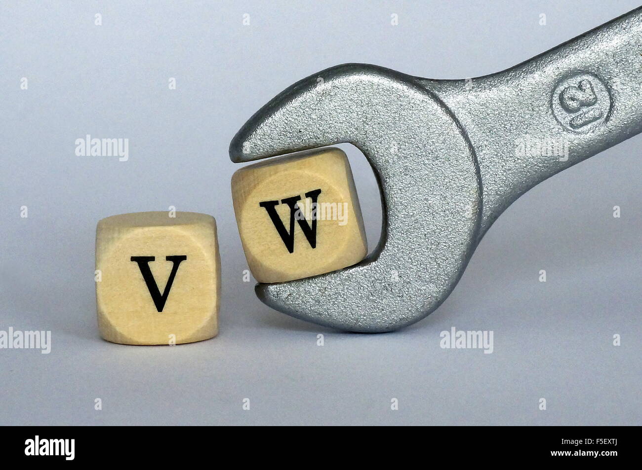 ILLUSTRATION - Cube letters which say 'VW' in a wrench. The photo was taken on 06 October 2015. Photo: S. Steinach - NO WIRE SERVICE - Stock Photo