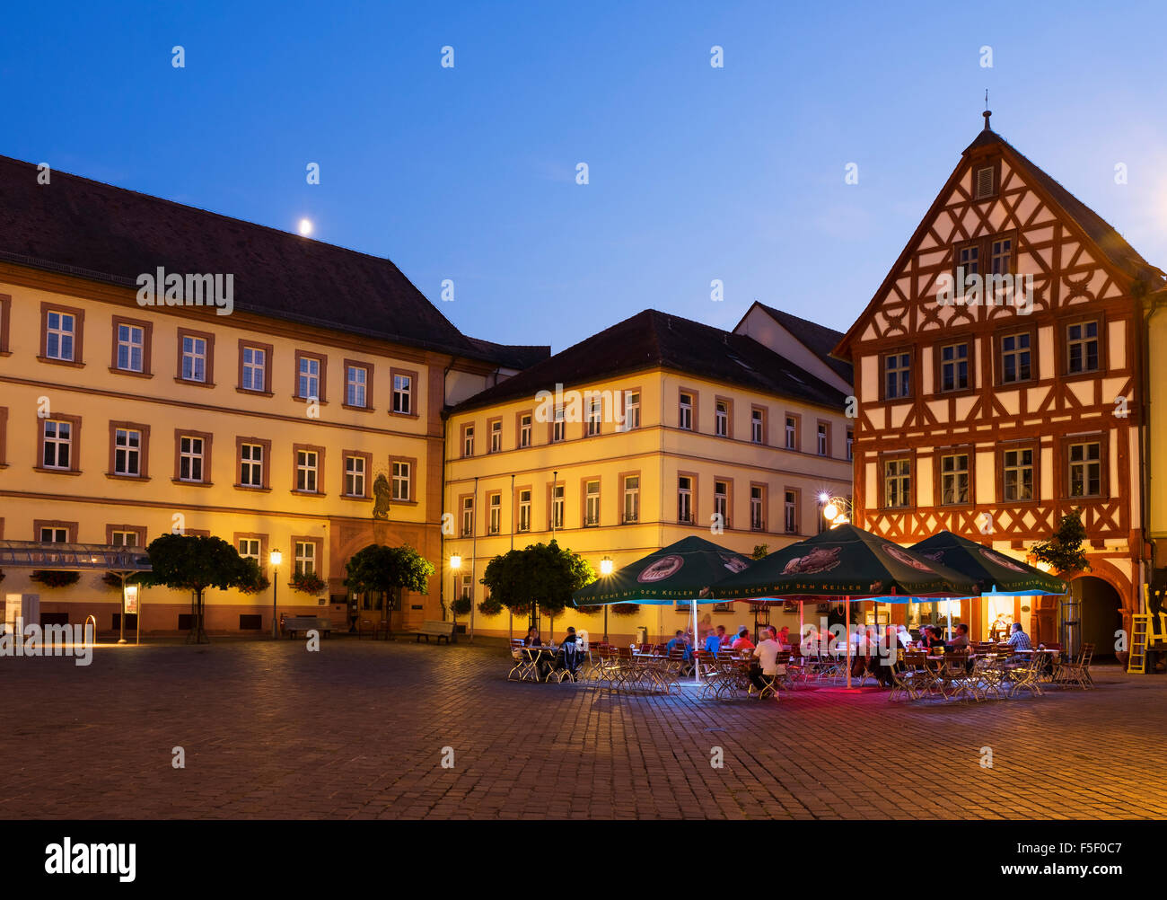 Marketplace at dusk, Karlstadt, Lower Franconia, Franconia, Bavaria, Germany Stock Photo