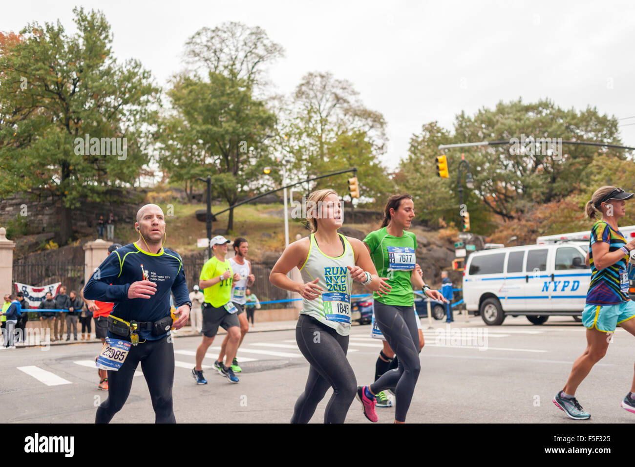 Runners pass through Harlem in New York near the 22 mile mark near Mount Morris Park on Sunday, November 1, 2015 in the  45th annual TCS New York City Marathon. Over 50,000 runners are expected to finish the race, the world's largest marathon.  (© Richard B. Levine) Stock Photo