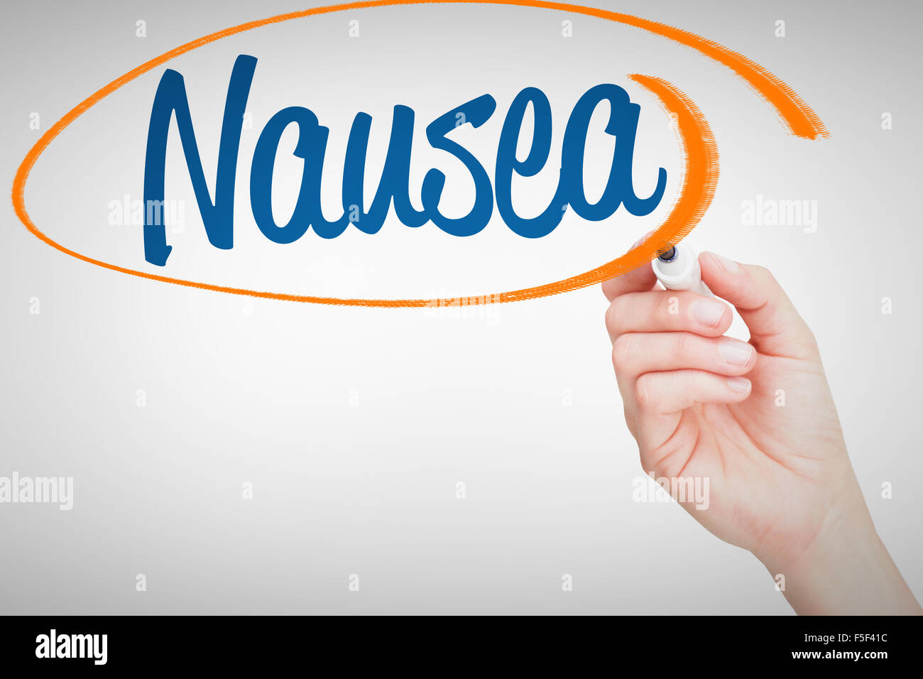 Nausea against female hand holding black whiteboard marker Stock Photo