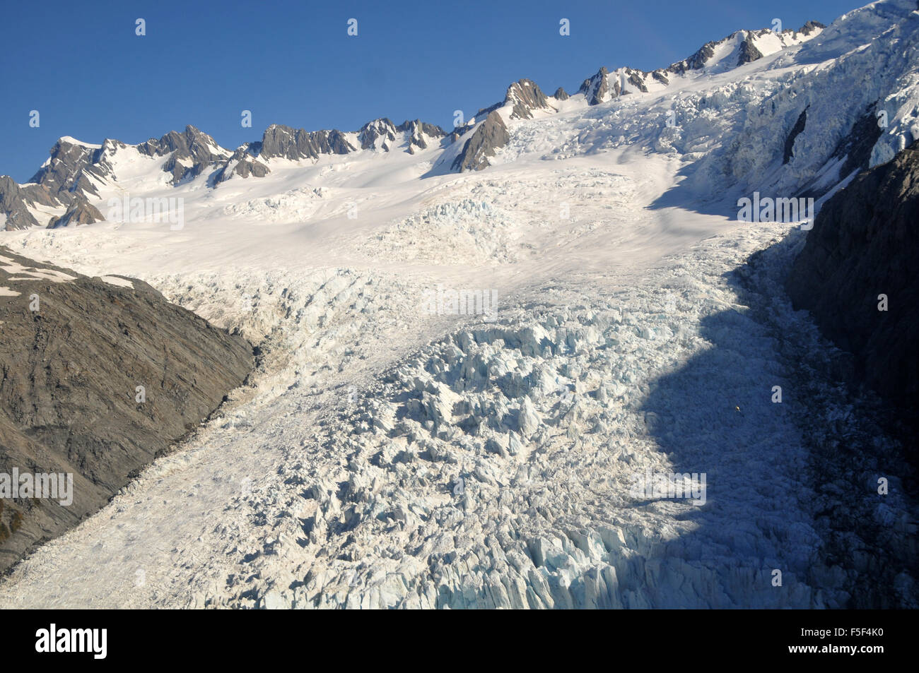 Franz Josef Glacier, a glacier melting due to climate change, Franz Josef, South Island, New Zealand Stock Photo