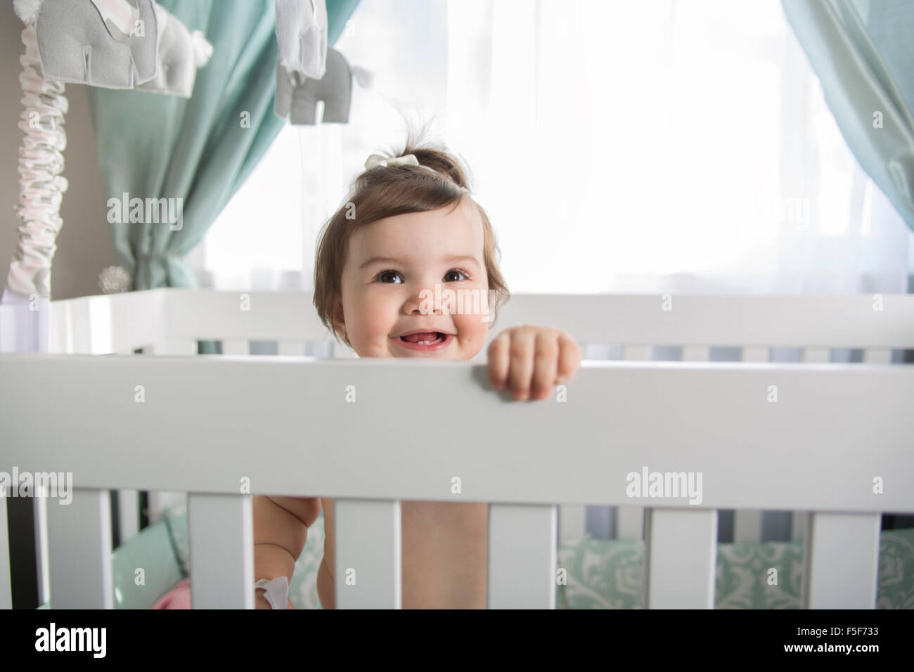 Cradle baby hi-res stock photography and images - Alamy