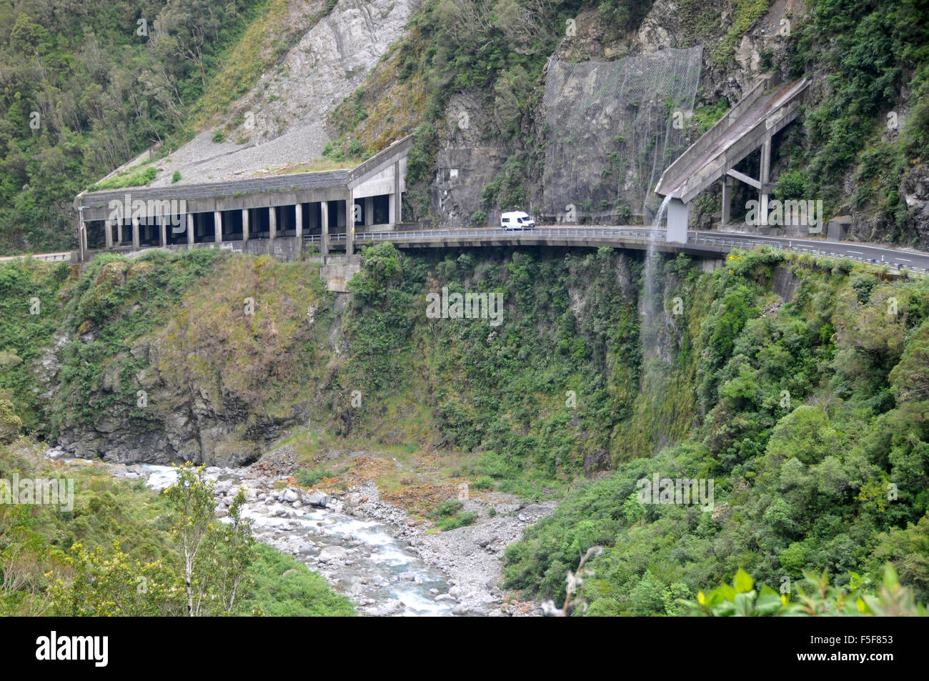 Rock shelter over State Highway 73 through the Otira Gorge near Arthur's Pass, South Island, New Zealand Stock Photo