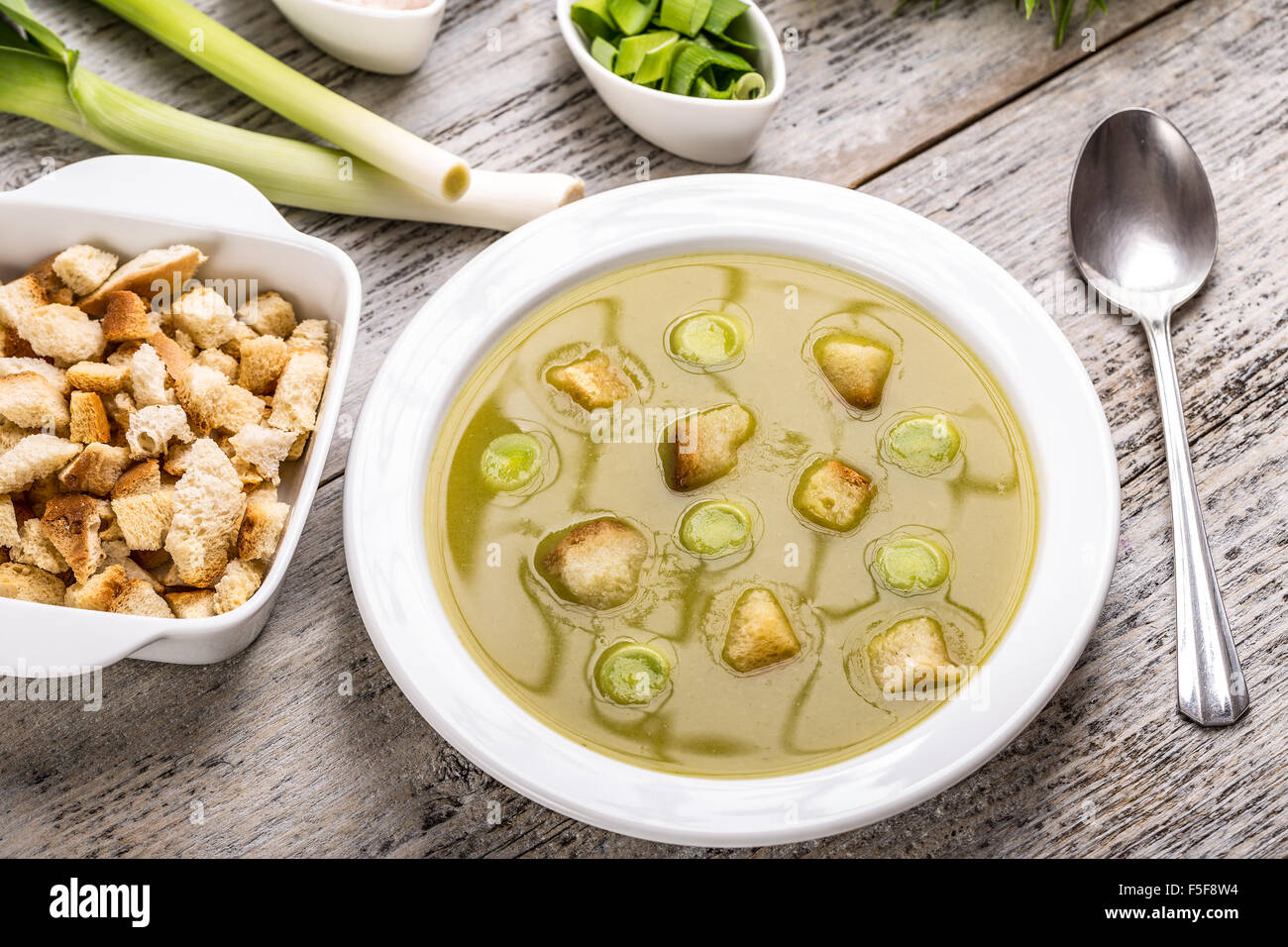 Delicious fresh leek soup in the white plate Stock Photo