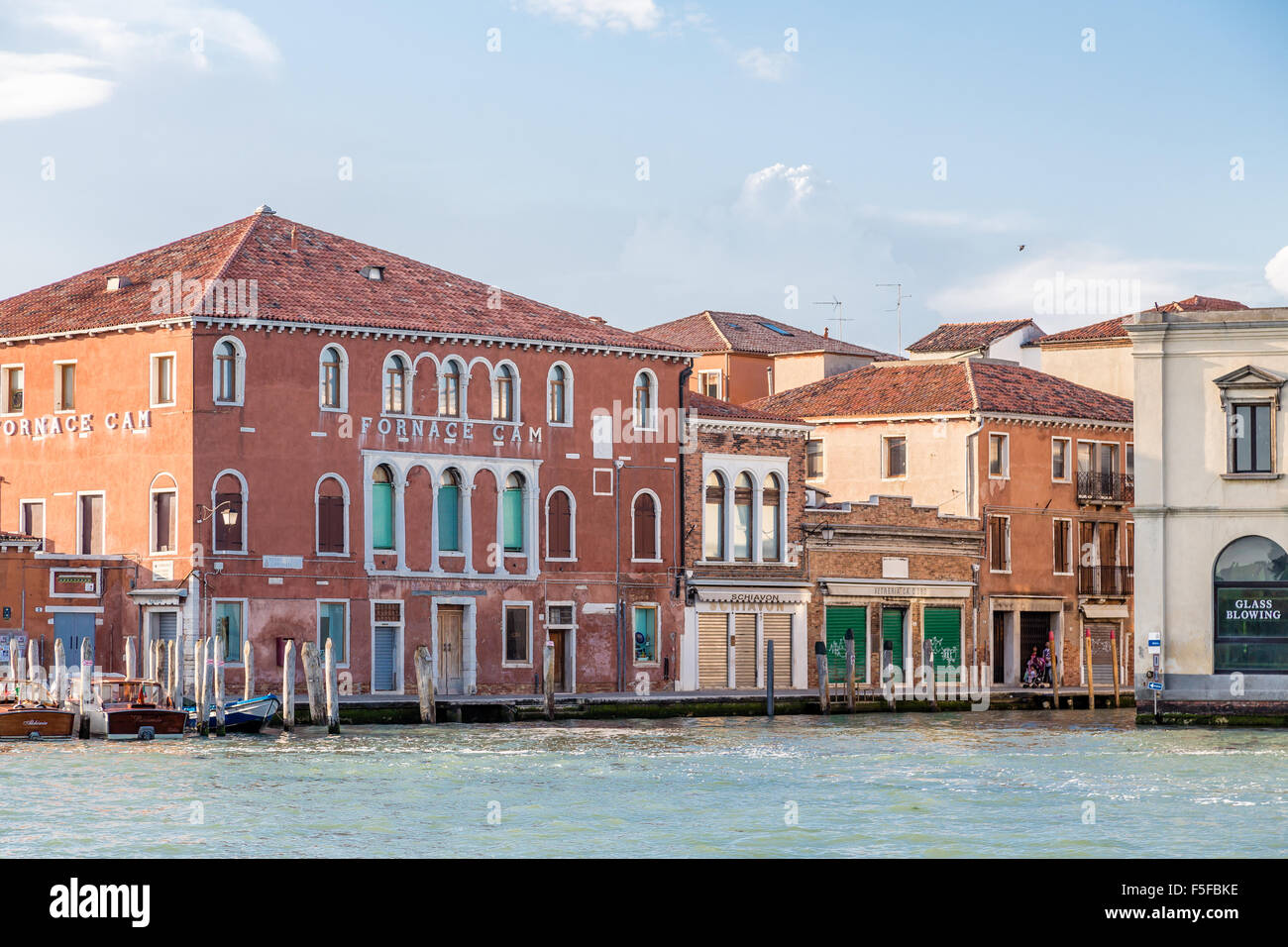 Colorful buildings along canal in Venice Stock Photo