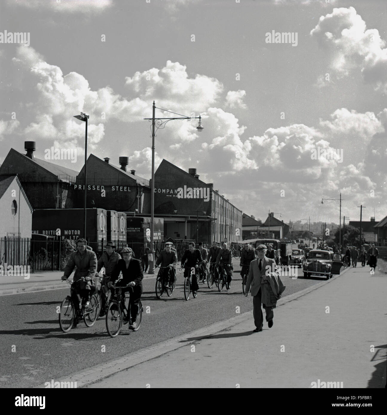 1950s historical, factory workers of the Pressed Steel Company, Cowley, Oxford, leave work on