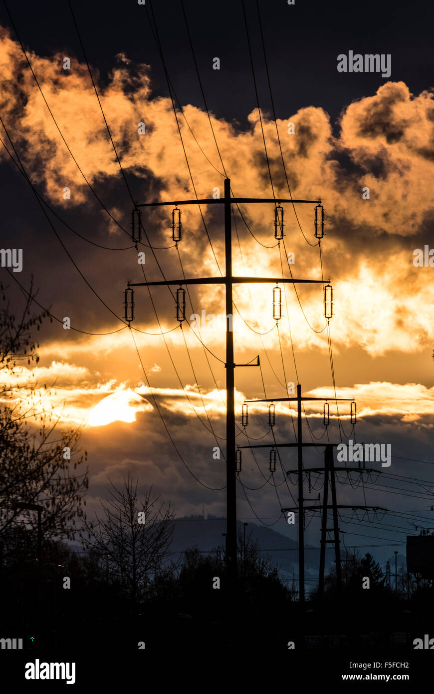 Power poles in front of sunset hi-res stock photography and images - Alamy
