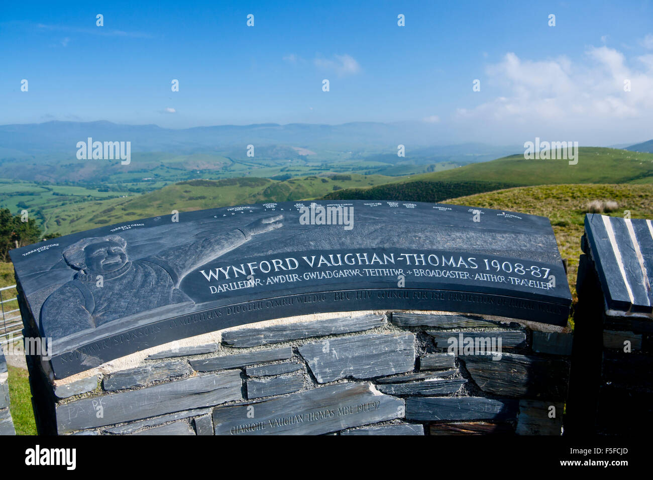 Memorial to broadcaster and writer Wynford Vaughan-Thomas with view to Welsh mountains Near Dylife Powys Mid Wales UK Stock Photo