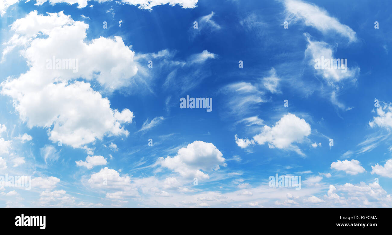 White heap clouds in the blue sky at the summer day. Stock Photo