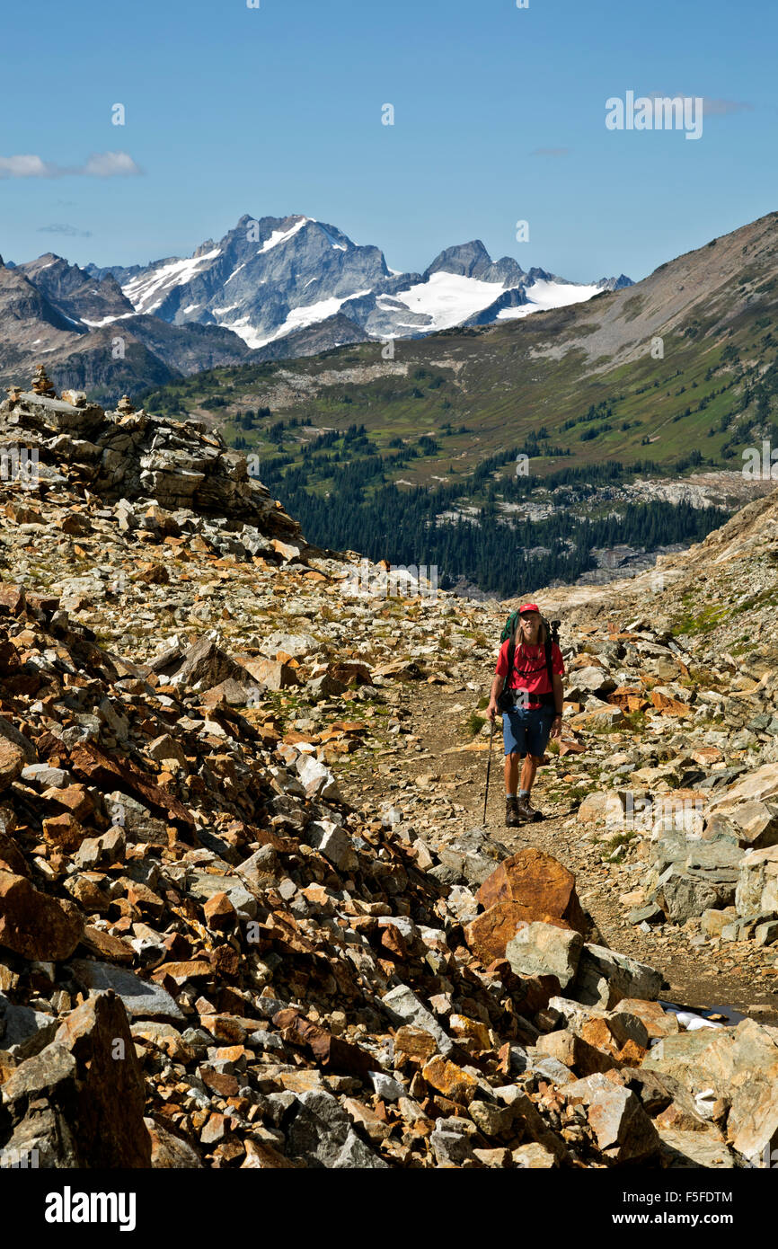 WA10825-00...WASHINGTON - Hiker at Spider Gap in the Glacier Peak Wilderness of the Cascade Mountains. Stock Photo