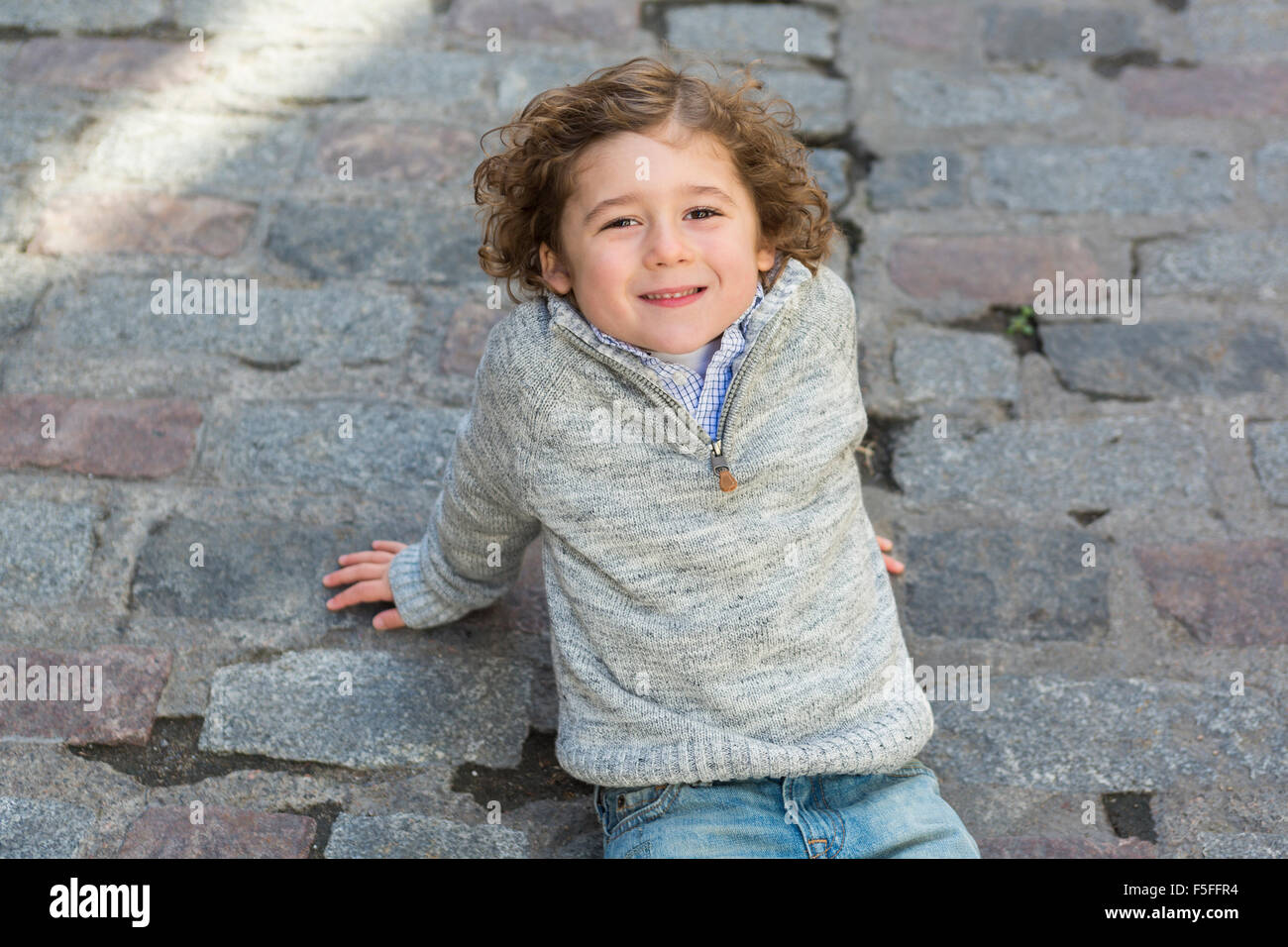 portrait of a boy on a urban background Stock Photo - Alamy