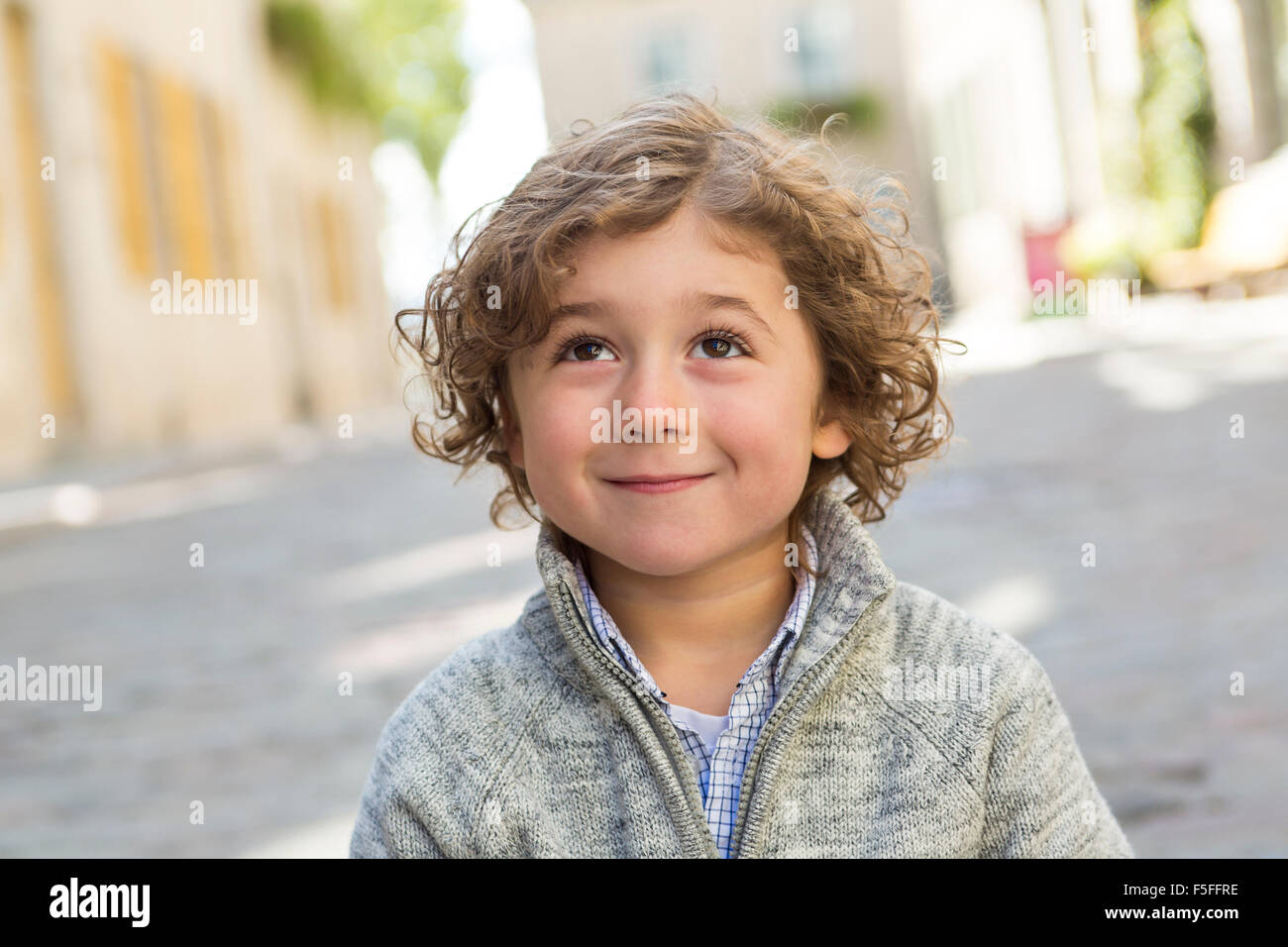 portrait of a boy on a urban background Stock Photo - Alamy