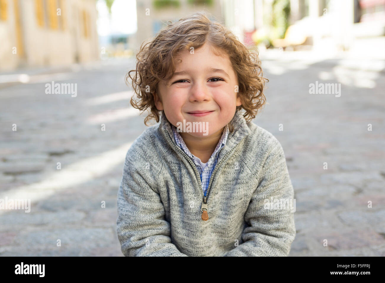 portrait of a boy on a urban background Stock Photo - Alamy