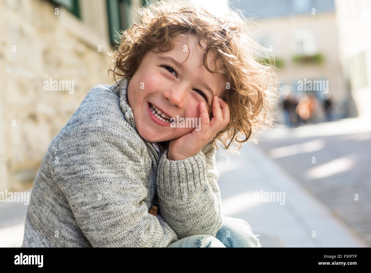 portrait of a boy on a urban background Stock Photo - Alamy