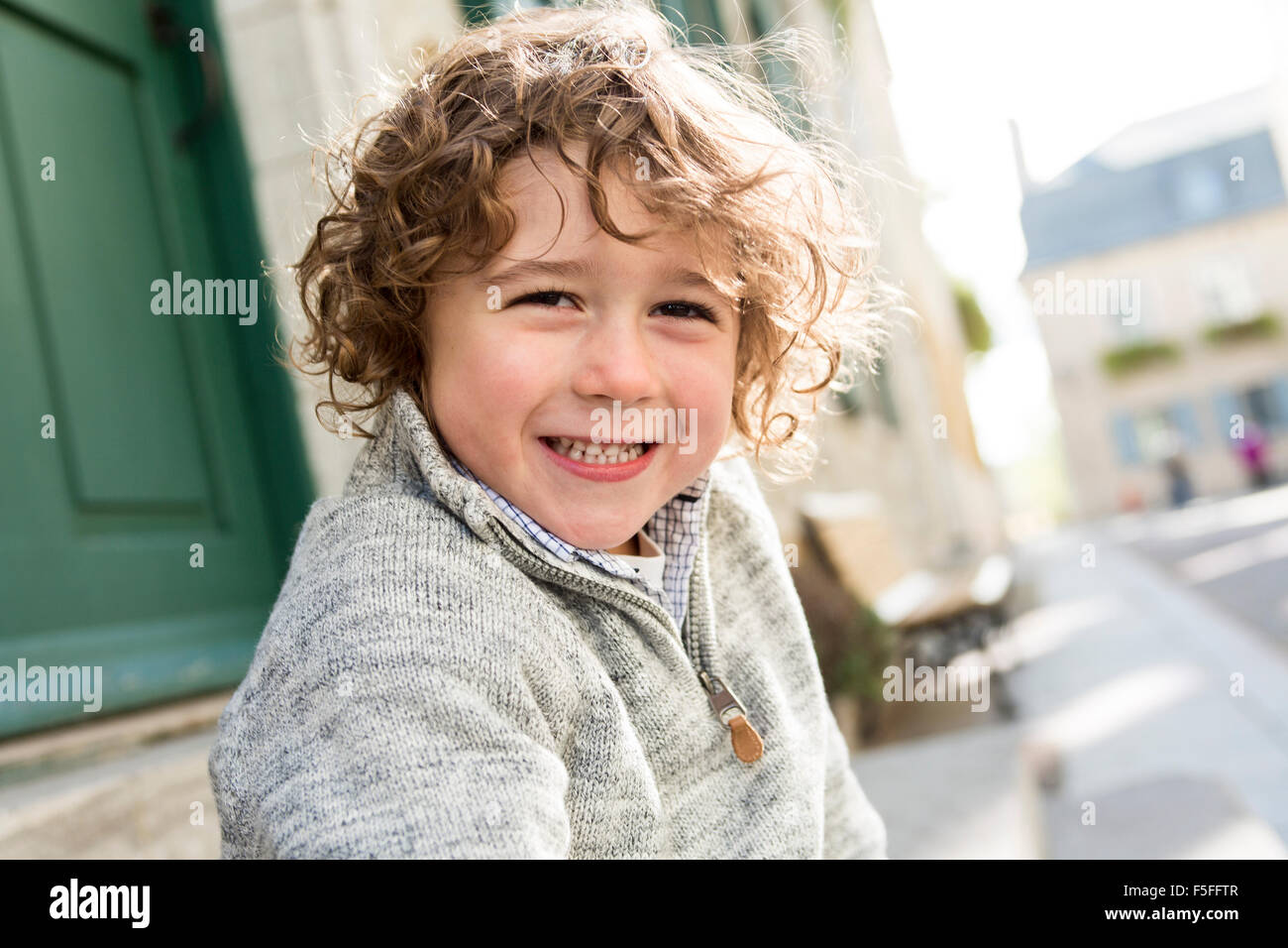 portrait of a boy on a urban background Stock Photo - Alamy