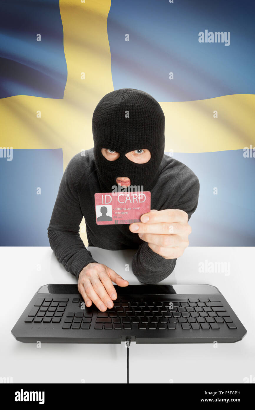 Hacker with ID card in hand and flag on background - Sweden Stock Photo