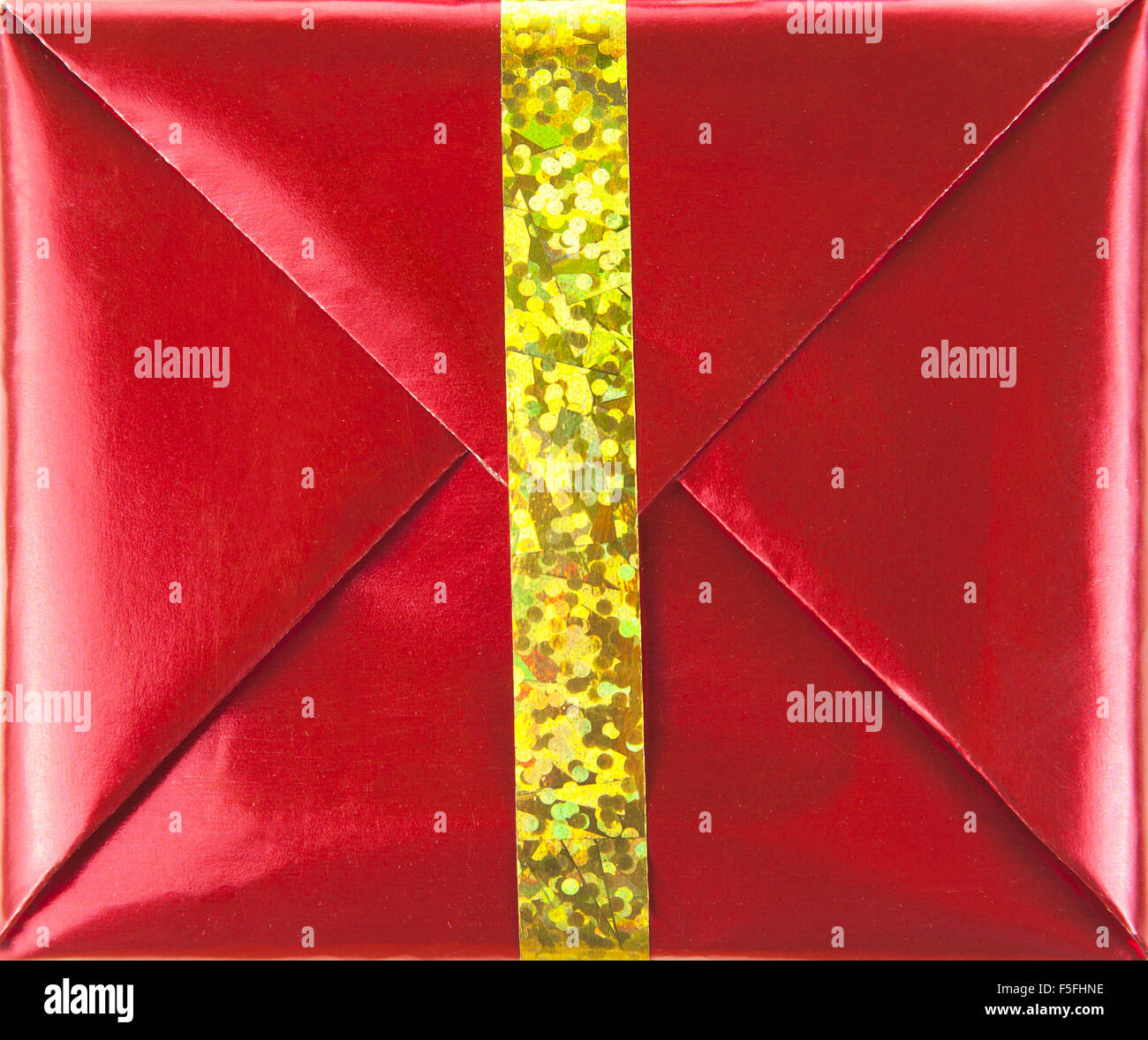 Red gift box with gold ribbon Stock Photo Alamy