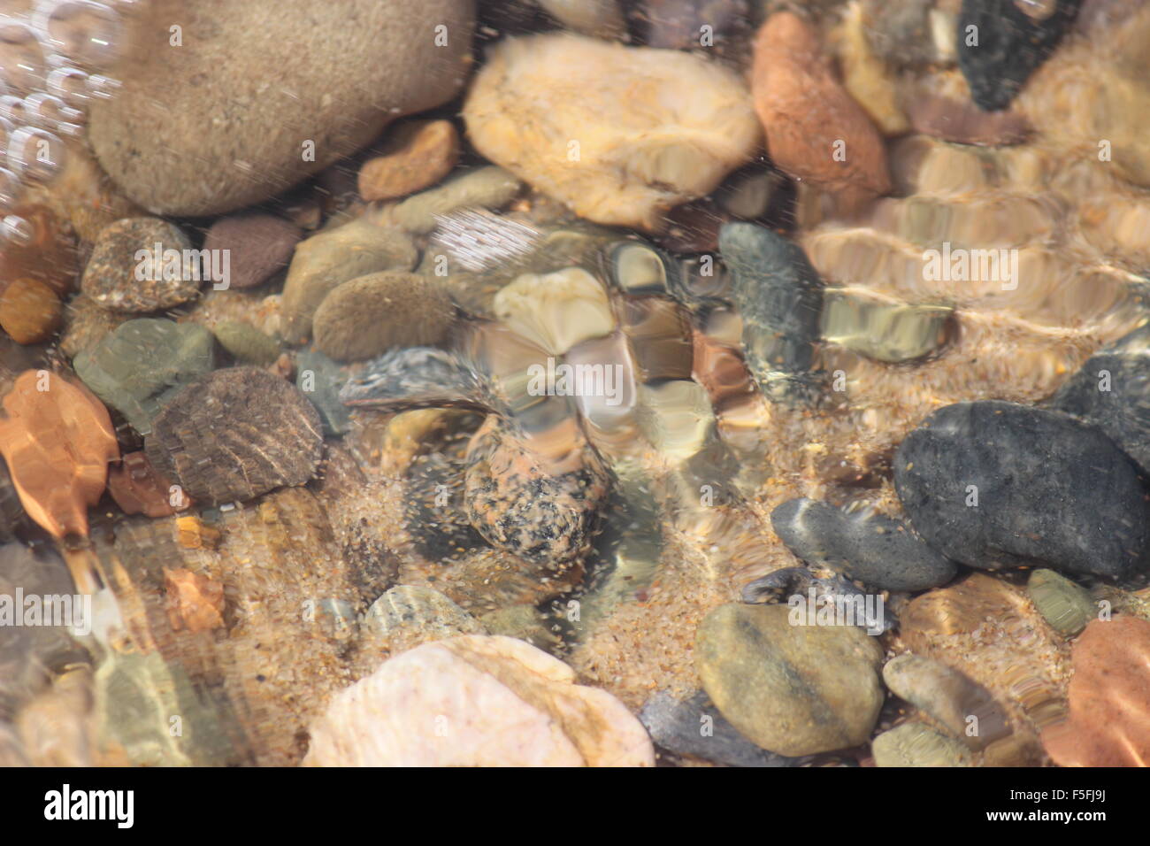 close-up of beach rock underwater at Inverness Beach, Nova Scotia, Canada Stock Photo