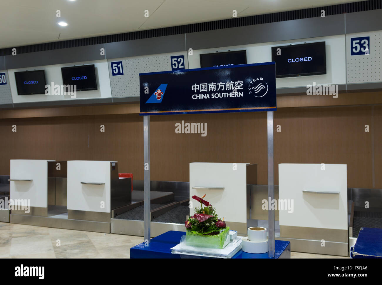 MANILA, PHILIPPINES - JUNE 10, 2015: Empty check in desk at Ninoy Aquino international airport. It is the largest airline compan Stock Photo