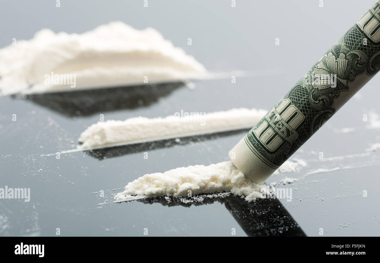 Cocaine and 10 dollars note Stock Photo