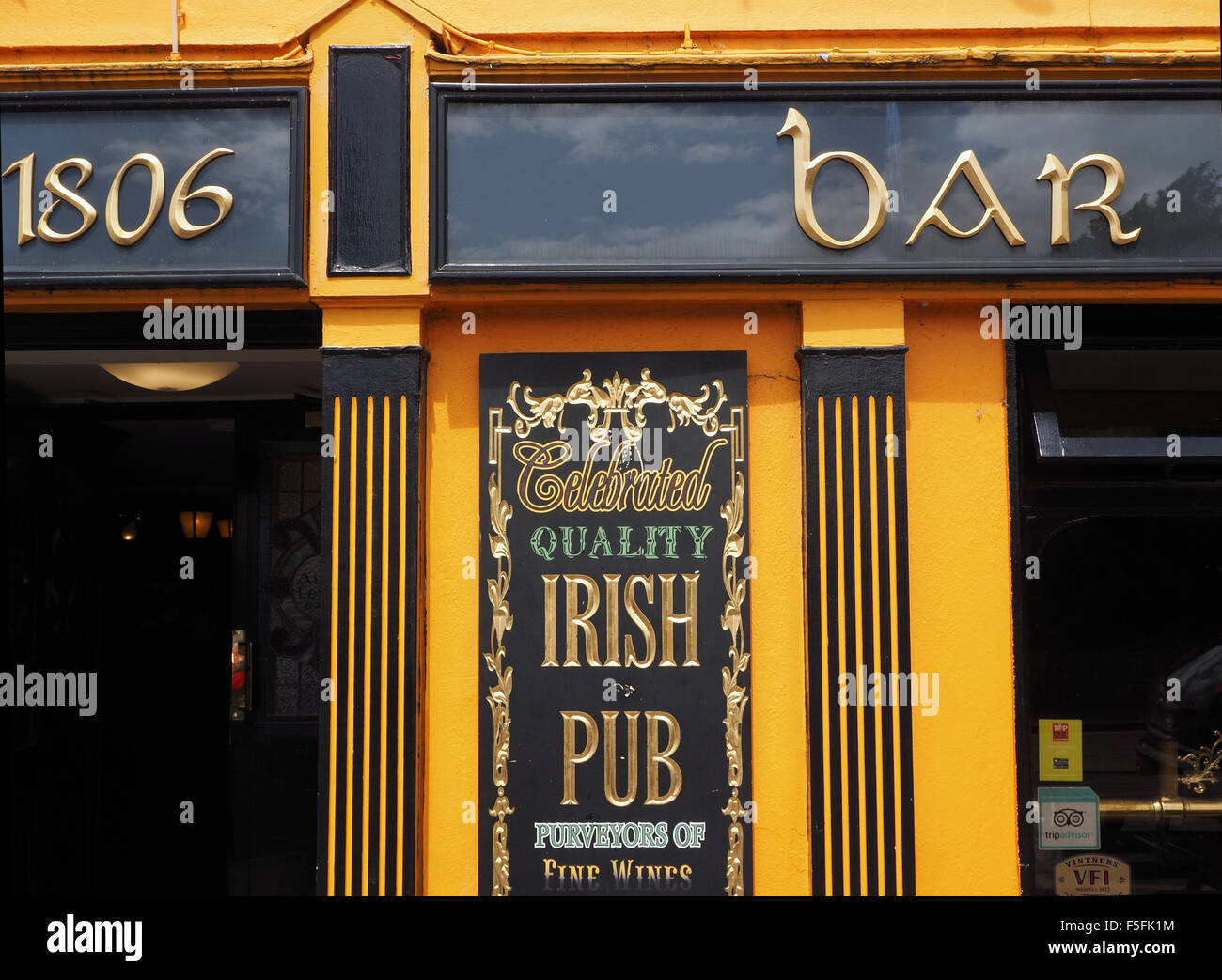 Colourful frontage to celebrated quality Irish Pub with date 1806 in Dingle town County Kerry Ireland Stock Photo