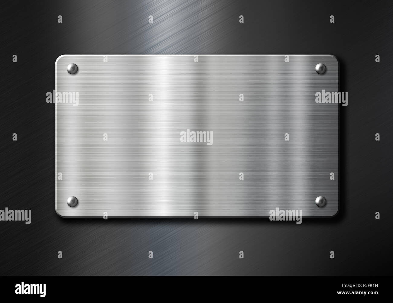 stainless steel metal plate over black background Stock Photo