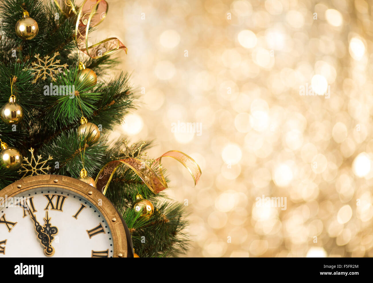Christmas tree with retro clock face Stock Photo - Alamy