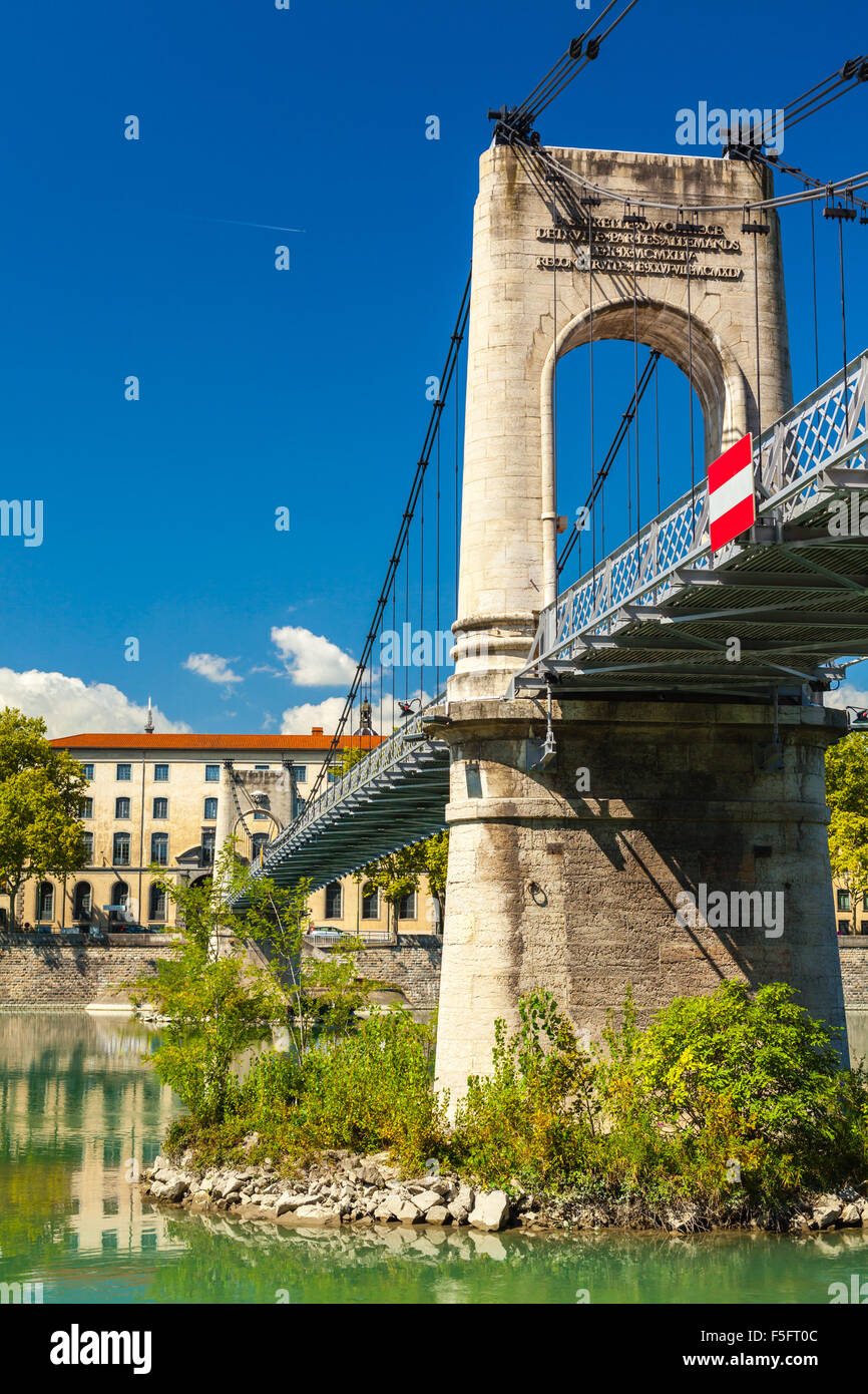 Old Passerelle du College bridge over Rhone river in Lyon, France. Summer day Stock Photo