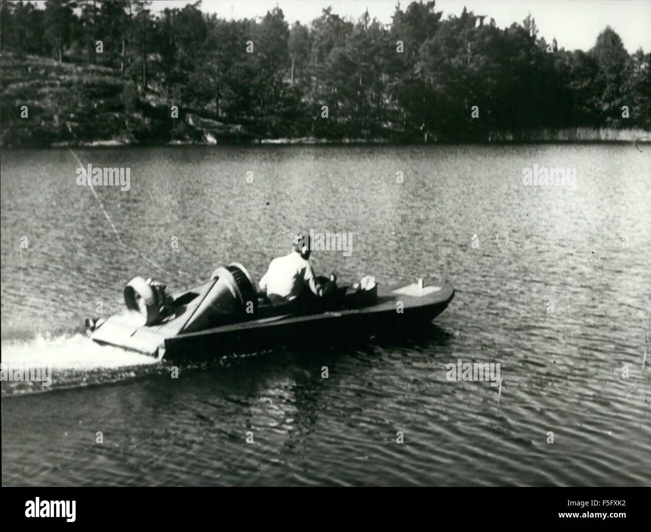 1972 - This semihovercraft is cheaper to build and run then a conventional AVC, and makes no ungulfing spray from blow-by except at the stern, where it is left behind. Devised in Sweden, this experimental one seater can dol8 knots with a 10 bhp engine driving both air propeller and lift fan. There are three ''keels'' enclosing the sides of the two section air cusion pressurized by the fan. At the rear the cusion is contained by an adjustable trim-flap, while ran air under forward travel minimize leakage in front. Hover-height is controlled by moving trim flap, which can be fully retracted to r Stock Photo