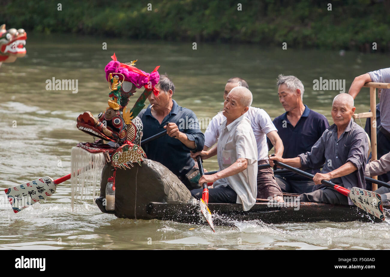 Dragon boat race in Xixi Wetland Park, Hangzhou, China during Dragon Boat Festival celebrations on June 20th 2015. Stock Photo