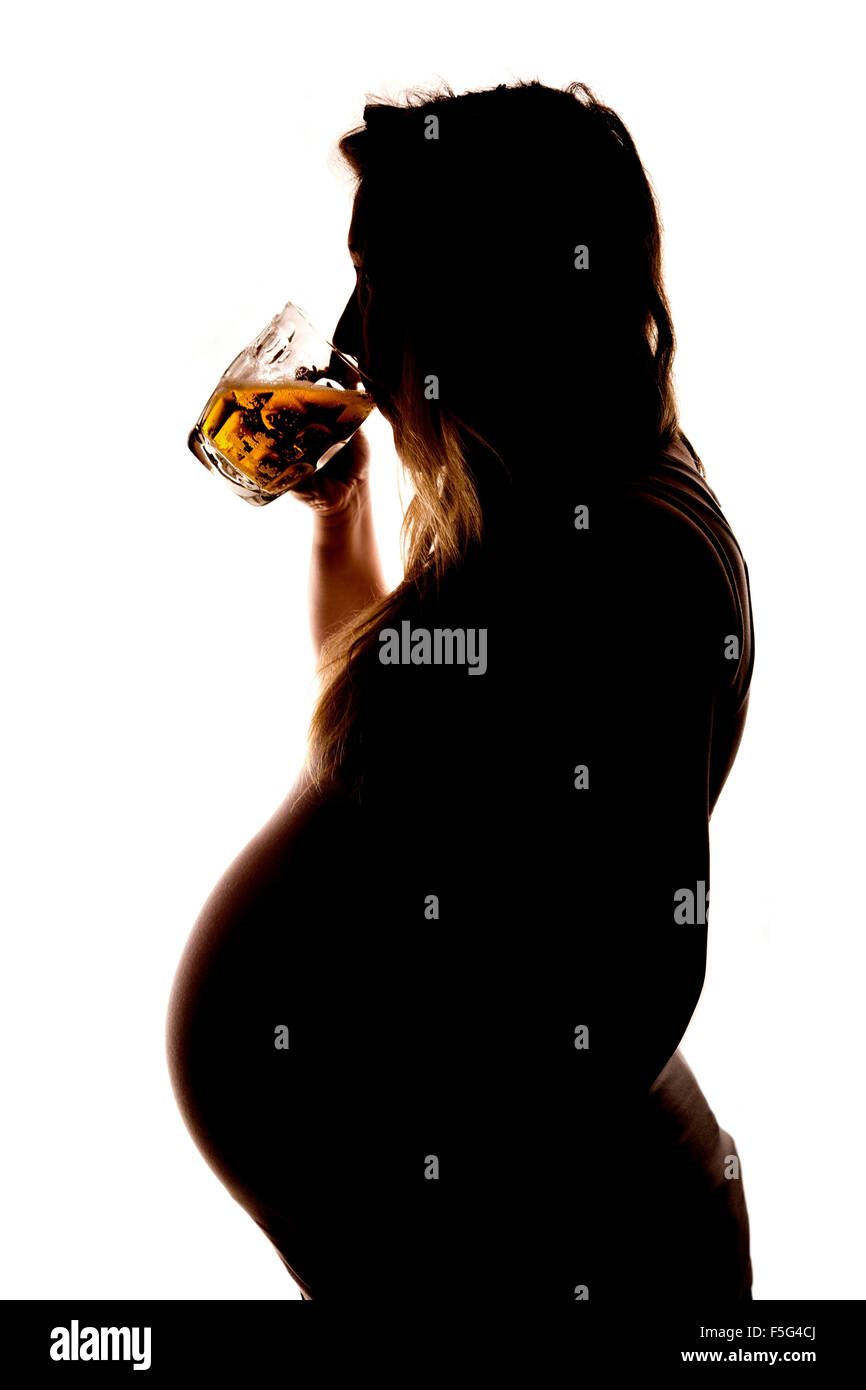 drinking beer during pregnancy silhouette on white background Stock Photo