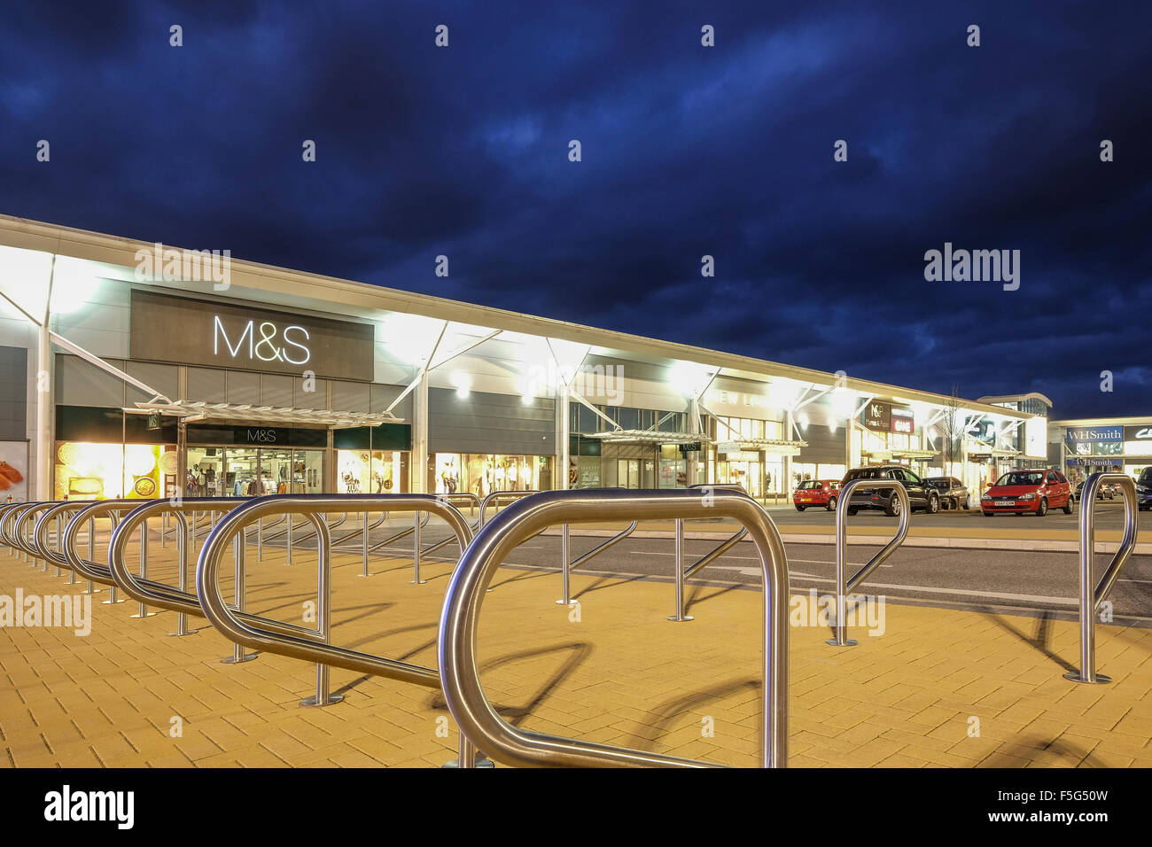 Marks and Spencers store at night at the Deepdale retail park in Preston, Lancashire Stock Photo