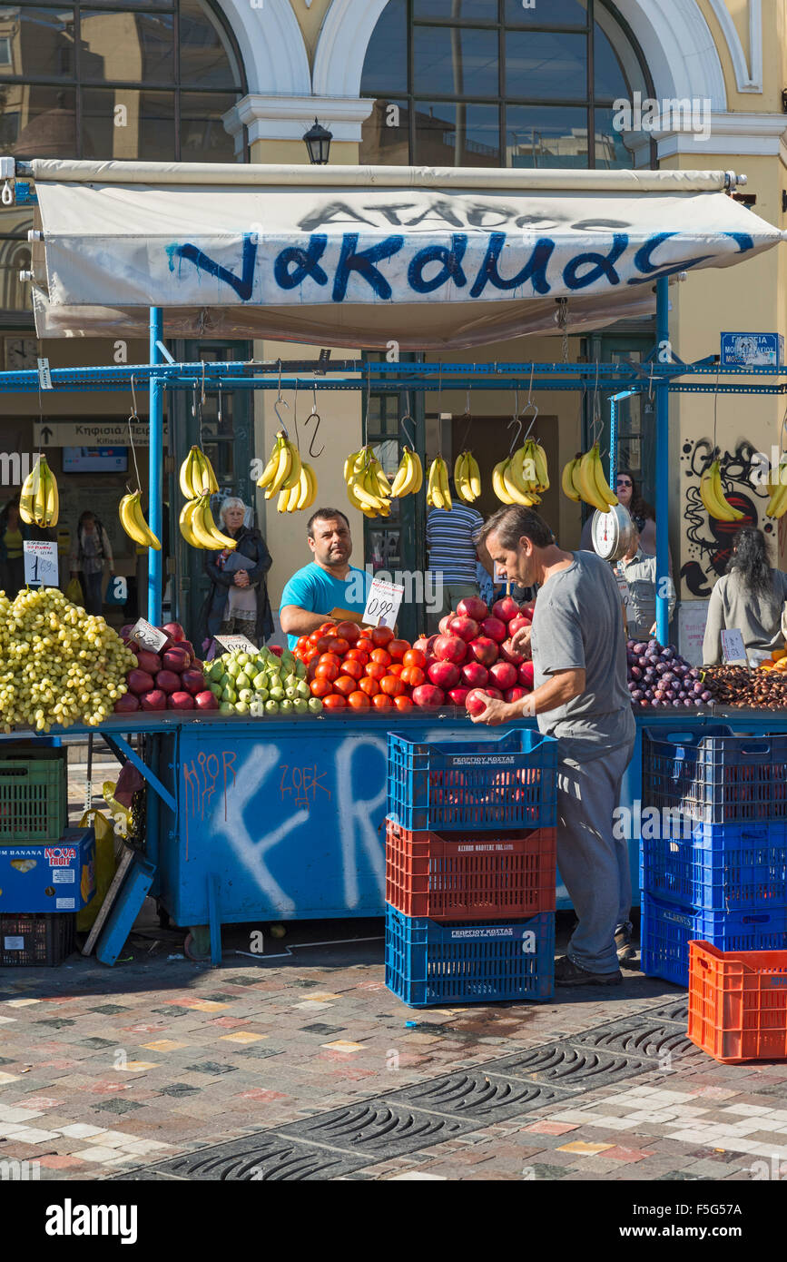 ATHENS, GREECE OCTOBER 27, 2015People selling fruit and vegetables from grocery store kiosk