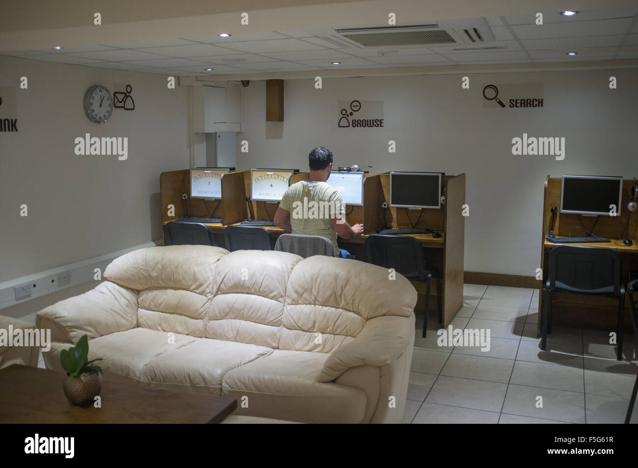 Internet cafe in the basement of a cafe in Islington, London. Stock Photo